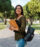 Young woman walking to class